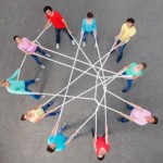 People playing with tangled string